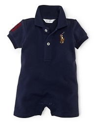 Channeling timeless, preppy style, a short-sleeved polo shortall is rendered in breathable cotton mesh with a ribbed-knit collar and an applied twill 3 patch. Channeling timeless, preppy style, a short-sleeved polo shortall is rendered in breathable cotton mesh with a ribbed-knit collar and an applied twill 3 patch.
