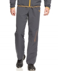 Move on down the road...or the court, or the field in these comfortable and stylish track pants from Puma. Move on down the road...or the court, or the field in these comfortable and stylish track pants from Puma.