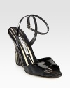Metallic details upgrade this patent leather silhouette with a sexy, wrap-around ankle strap. Linen-covered wedge, 4¼ (110mm)Patent leather upperAdjustable wrap-around ankle strapLinen liningLeather solePadded insoleMade in Italy