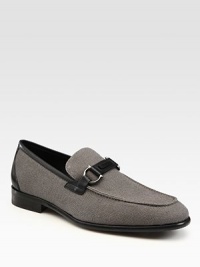 The classic Italian moccasin, interpreted for warm weather in woven linen with calfskin details and bridle bit hardware.Leather liningPadded insoleLeather soleMade in Italy The classic Italian moccasin, interpreted for warm weather in woven linen with calfskin details and bridle bit hardware.Leather liningPadded insoleLeather soleMade in Italy