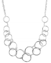 Let your look come full circle with the addition of this chic frontal necklace. Nine West design highlights interlocking cut-out circles on a matching chain. Crafted in silver tone mixed metal. Approximate length: 16 inches. Let your look come full circle with the addition of this chic frontal necklace. Nine West design highlights interlocking cut-out circles on a matching chain. Crafted in silver tone mixed metal. Approximate length: 16 inches.