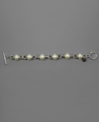 Dabble in dainty style with this beautiful bracelet by AK Anne Klein featuring glass pearls set in silvertone mixed metal. Approximate length: 7-1/2 inches. Dabble in dainty style with this beautiful bracelet by AK Anne Klein featuring glass pearls set in silvertone mixed metal. Approximate length: 7-1/2 inches.
