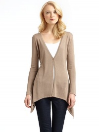 THE LOOKV necklineLong sleevesSingle-button closureAsymmetric hemTHE FITAbout 36 from shoulder to hemTHE MATERIALSilkCARE & ORIGINDry cleanImportedModel shown is 5'11 (180cm) wearing US size Small. THE LOOKV necklineLong sleevesSingle-button closureAsymmetric hemTHE FITAbout 36 from shoulder to hemTHE MATERIALSilkCARE & ORIGINDry cleanImportedModel shown is 5'11 (180cm) wearing US size Small.