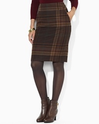 Crafted in a classic plaid pattern, the chic skirt is tailored in a sophisticated straight silhouette with clean lines and hallmark details for a heritage-inspired look.Wide clean waistband with suede buckle-tab closure at side seam. Crafted in a classic plaid pattern, the chic skirt is tailored in a sophisticated straight silhouette with clean lines and hallmark details for a heritage-inspired look.Wide clean waistband with suede buckle-tab closure at side seam.