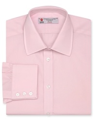 From the premier clothier Turnbull & Asser and rendered in smooth, crisp cotton poplin, this solid dress shirt anchors your attire in classic luxury. From the premier clothier Turnbull & Asser and rendered in smooth, crisp cotton poplin, this solid dress shirt anchors your attire in classic luxury.