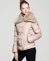 Cozy-chic in a slim silhouette, this Dawn Levy jacket is embellished with fur-lined spread collar and channel quilting for a luxe, polished finish. Cozy-chic in a slim silhouette, this Dawn Levy jacket is embellished with fur-lined spread collar and channel quilting for a luxe, polished finish.