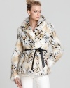 Oh-so-soft, this sumptuous Rachel Zoe jacket flaunts a vintage cheetah print for cold-weather chic.