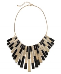 Get caught up in the fray. This chunky, graduated design from Bar III incorporates the season's colorblocking trend with solid blocks of black enamel over gold tone mixed metal. Approximate length: 17 inches + 3-inch extender. Approximate drop length: 3-1/2 inches. Approximate drop width: 7-1/2 inches. Get caught up in the fray. This chunky, graduated design from Bar III incorporates the season's colorblocking trend with solid blocks of black enamel over gold tone mixed metal. Approximate length: 17 inches + 3-inch extender. Approximate drop length: 3-1/2 inches. Approximate drop width: 7-1/2 inches.