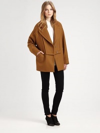 Menswear-inspired coat in an Italian, wool-rich silhouette with dropped shoulders and convenient snap closures. Notched lapelsDropped shouldersLong sleevesFront snap closuresSlash pocketsBack self beltAbout 30 from shoulder to hem75% wool/25% nylonDry cleanMade in ItalyModel shown is 5'10 (177cm) wearing US size 4. Menswear-inspired coat in an Italian, wool-rich silhouette with dropped shoulders and convenient snap closures. Notched lapelsDropped shouldersLong sleevesFront snap closuresSlash pocketsBack self beltAbout 30 from shoulder to hem75% wool/25% nylonDry cleanMade in ItalyModel shown is 5'10 (177cm) wearing US size 4.