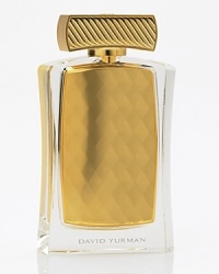 Born out of an artist's passion for life, the David Yurman fragrance is an elegant fusion of luxurious materials, iconic design and sensual beauty. The boldness of exotic woods and patchouli intertwines with the fluidity of rose and waterlily. The fragrance is held in a stunning, faceted golden jewel accented by David Yurman's signature cable motif.