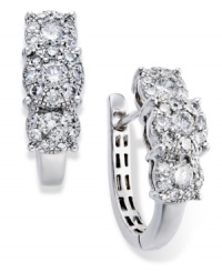 Prestige Unity adds a hint of glam to traditional hoop earrings. Several round-cut diamonds comprise a unique three-stone design (1 ct. t.w.) in a polished 14k white gold setting. Approximate diameter: 16 mm.