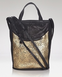 This leather Pour La Victoire satchel is everything we want in a day bag: spacious, slightly slouchy, and so effortless that it can dart from desk-to-downtown without loosing its cool. This leather Pour La Victoire satchel is everything we want in a day bag: spacious, slightly slouchy, and so effortless that it can dart from desk-to-downtown without loosing its cool.