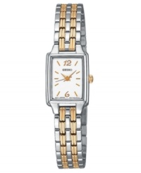 A timelessly elegant style, this watch makes the perfect addition to your permanent collection. Two-tone stainless steel bracelet and square silvertone case, 24mm. Square white dial with logo and stick and numeral indices. Quartz movement. Water resistant to 50 meters. Three-year limited warranty. A timelessly elegant style, this watch makes the perfect addition to your permanent collection. Two-tone stainless steel bracelet and square silvertone case, 24mm. Square white dial with logo and stick and numeral indices. Quartz movement. Water resistant to 50 meters. Three-year limited warranty.
