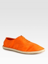 The natural look of a rope-heeled espadrille finished in a modern-style leather lace-up.Leather upperPadded insoleRubber soleMade in Italy The natural look of a rope-heeled espadrille finished in a modern-style leather lace-up.Leather upperPadded insoleRubber soleMade in Italy