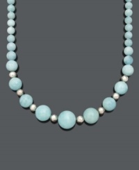 Smooth out your look in sweet, ocean-inspired style. This breezy necklace features graduated 8 to 20 millimeter aquamarine beads (480 ct. t.w.) with small, sterling silver accent beads and clasp. Approximate length: 18 inches. Smooth out your look in sweet, ocean-inspired style. This breezy necklace features graduated 8 to 20 millimeter aquamarine beads (480 ct. t.w.) with small, sterling silver accent beads and clasp. Approximate length: 18 inches.