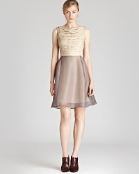 This statement REISS dress is a key piece for the new season, and the double layered finish of the skirt is a glamorous addition to your wardrobe. Pair with statement shoes and chunky accessories to punctuate the cocktail look. This statement REISS dress is a key piece for the new season, and the double layered finish of the skirt is a glamorous addition to your wardrobe. Pair with statement shoes and chunky accessories to punctuate the cocktail look.