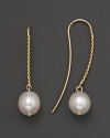 Freshwater pearls add rich luster to 14K yellow gold.