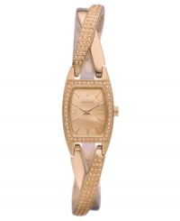 Wrap your wrists in the rosy warmth and glittering crystals on this DKNY watch. Wrap your wrists in the rosy warmth and glittering crystals on this DKNY watch.