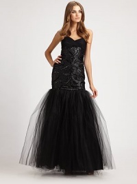 A grand-entrance design, this body-conscious stretch style has fabulous beading and a flurry of tulle at the hem.StraplessPleated tulle bodiceLavish beadingShirred tulle hemLinedAbout 46 from natural waistNylonDry cleanImportedModel shown is 5'11 (180cm) wearing US size 4. A grand-entrance design, this body-conscious stretch style has fabulous beading and a flurry of tulle at the hem.StraplessPleated tulle bodiceLavish beadingShirred tulle hemLinedAbout 46 from natural waistNylonDry cleanImportedModel shown is 5'11 (180cm) wearing US size 4.