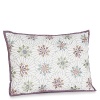 Fashioned to resemble flowers, this pillow in its colorful pastels will brighten any room.