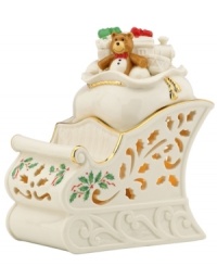 With an inner glow, pierced detail and a holly motif to match the beloved Holiday pattern, this porcelain sleigh figurine from Lenox captures the childlike joy of the season. With an inner glow, pierced detail and a holly motif to match the beloved Holiday pattern, this porcelain sleigh figurine from Lenox captures the childlike joy of the season.