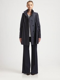 Dramatic and sculptural, featuring a bold funnel collar and unique side pleating.Funnel collarConcealed button frontSide gathersAbout 31 from shoulder to hemCottonDry cleanImportedModel shown is 5'11 (180cm) wearing US size 4. Dramatic and sculptural, featuring a bold funnel collar and unique side pleating.Funnel collarConcealed button frontSide gathersAbout 31 from shoulder to hemCottonDry cleanImportedModel shown is 5'11 (180cm) wearing US size 4.