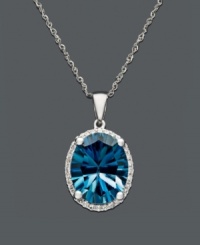 Take your style up a notch with bright, bold color. This brilliant oval-cut London blue topaz (4-1/10 ct. t.w.) sits in a shining 14k white gold setting with a sweet dusting of diamonds at the edges. Approximate length: 18 inches. Approximate drop: 5/8 inch. Take your style up a notch with bright, bold color. This brilliant oval-cut London blue topaz (4-1/10 ct. t.w.) sits in a shining 14k white gold setting with a sweet dusting of diamonds at the edges. Approximate length: 18 inches. Approximate drop: 5/8 inch.