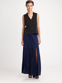 Glimmering silk and cotton in a lengthy, elegant silhouette with a button front and an unexpected side slit. Button frontSide slitAbout 40 long61% silk/39% cottonDry cleanImportedModel shown is 5'10 (177cm) wearing US size 2. Glimmering silk and cotton in a lengthy, elegant silhouette with a button front and an unexpected side slit. Button frontSide slitAbout 40 long61% silk/39% cottonDry cleanImportedModel shown is 5'10 (177cm) wearing US size 2.