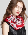 Cozy cashmere takes an unexpected turn with DIANE von FURSTENBERG's striking, chain-print scarf.