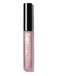 Infused with just a hint of pearly shimmer, this gives lips a subtle, glimmering look. Inspired by the play of pretty shades with an edgy twist, this gloss is part of Bobbi's Caviar & Oyster Collection and adds non-sticky shine to bare lips or your favorite lipstick. Formulated with aloe extract to soothe and soften lips; Vitamins C and E for anti-oxidant protection; and jojoba and avocado oils to moisturize lips. Made in USA. 