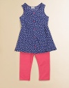 Pretty little polka dots and contrasting buttons add punch to a charming, flared tunic, paired with soft leggings.Round necklineSleevelessPullover styleFlared hemElastic waist47% pima cotton/47% modal/6% spandexMachine washImported