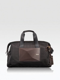 From workout bag to weekender, this satchel expands a full 5 to accommodate your changing travel needs; allows you to bring home more than you left with. Features longer carry handles and a removable shoulder strap.Zip closureDouble top handlesIdentification tagExterior, interior compartmentsNylon19W x 11H x 5DImported From workout bag to weekender, this satchel expands a full 5 to accommodate your changing travel needs; allows you to bring home more than you left with. Features longer carry handles and a removable shoulder strap.Zip closureDouble top handlesIdentification tagExterior, interior compartmentsNylon19W x 11H x 5DImported