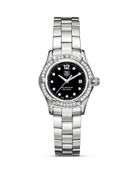 This sporty and elegant Aquaracer watch features a Steel bracelet and steel case surrounding a graceful black and diamond dial with full diamond bezel. This sporty and elegant Aquaracer watch features a Steel bracelet and steel case surrounding a graceful black and diamond dial with full diamond bezel.