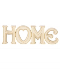 Home is undoubtedly where the heart is in this Lenox figurine, a beautiful addition to a bookshelf or mantel in gold-trimmed ivory porcelain.