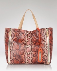 Sam Edelaman is known for it's edgy-cool aesthetic, and this tote proves the style can be practical too. In a roomy shape and python-print, it's the perfect bag to give your new-season outfits an in-demand focal point. Sam Edelaman is known for it's edgy-cool aesthetic, and this tote proves the style can be practical too. In a roomy shape and python-print, it's the perfect bag to give your new-season outfits an in-demand focal point.