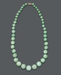 Spruce up your style in fresh, spring color. This beautiful, graduated necklace features jade beads (7-17 mm) set in 14k gold. Approximate length: 18 inches. Spruce up your style in fresh, spring color. This beautiful, graduated necklace features jade beads (7-17 mm) set in 14k gold. Approximate length: 18 inches.