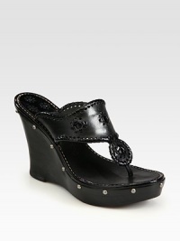 A supple leather sandal with funky details like stud trim and shapely wood wedge.Wooden heel, 4½ (115mm) Wooden platform, 1½ (40mm) Compares to a 3 heel (75mm) Open toe Slip-on style Leather lining Padded insole Rubber sole Made in USAOUR FIT MODEL RECOMMENDS ordering true size.. A supple leather sandal with funky details like stud trim and shapely wood wedge.Wooden heel, 4½ (115mm) Wooden platform, 1½ (40mm) Compares to a 3 heel (75mm) Open toe Slip-on style Leather lining Padded insole Rubber sole Made in USAOUR FIT MODEL RECOMMENDS ordering true size..
