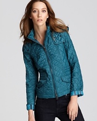 Cut from a vibrant turquoise, this lightweight Burberry Brit jacket adds a decadent dose of color to the everyday. Cut from a vibrant turquoise, this lightweight Burberry Brit jacket adds a decadent dose of color to the everyday.