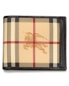 The classic check pattern and signature Burberry logo on the exterior of this bi-fold wallet is a constant reminder of your taste for the finer things in life.