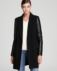 Luxurious leather accents are the chic touches that elevate this classic Theory Peacoat to a higher level of sophistication. Luxurious leather accents are the chic touches that elevate this classic Theory Peacoat to a higher level of sophistication.