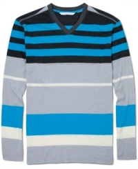 Striping it rich: Sean John designs a V-neck knit top in a four-season cotton blend spiked with the surprise of irregular stripes. Striping it rich: Sean John designs a V-neck knit top in a four-season cotton blend spiked with the surprise of irregular stripes.