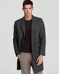 A modern 3-button sport coat design extends to above the knee for a handsome finish that suits every environment. A modern 3-button sport coat design extends to above the knee for a handsome finish that suits every environment.