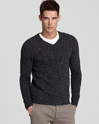 With a speckled knit and long sleeves, the versatile Malthus features a V-neck that works equally well with a crewneck tee or a collared dress shirt. With a speckled knit and long sleeves, the versatile Malthus features a V-neck that works equally well with a crewneck tee or a collared dress shirt.