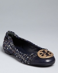 Tory Burch takes one of your favorite ballet flats into cooler weather in stylish tweed, polished off with leather cap toes and signature logo hardware. Tory Burch takes one of your favorite ballet flats into cooler weather in stylish tweed, polished off with leather cap toes and signature logo hardware.