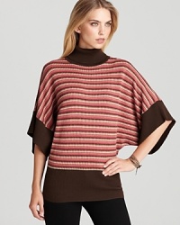 Stylish dolman sleeves add a chic new look to this Trina Turk sweater--a classic turtleneck, striped to the nines, for an outstanding fall look. Stylish dolman sleeves add a chic new look to this Trina Turk sweater--a classic turtleneck, striped to the nines, for an outstanding fall look.