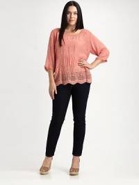 Intricate embroidery gives this top a bohemian feel. Its relaxed fit and three-quarter sleeves offers you arm coverage and a beyond-flattering look.Round neckThree-quarter sleevesEmbroidered detailsScalloped hemAbout 29 from shoulder to hemRayonMachine washImported Intricate embroidery gives this top a bohemian feel. Its relaxed fit and three-quarter sleeves offers you arm coverage and a beyond-flattering look.Round neckThree-quarter sleevesEmbroidered detailsScalloped hemAbout 29 from shoulder to hemRayonMachine washImported
