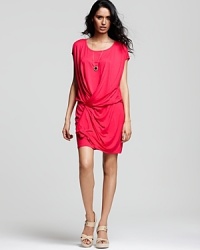 Three Dots' ultra-versatile dress flaunts a draped silhouette and shock of color for go-to summer style. Three Dots' ultra-versatile dress flaunts a draped silhouette and shock of color for go-to summer style.