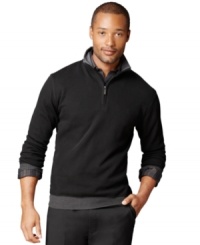 Stay solid. From jeans to dress pants, this Van Heusen sweater is the perfect layering piece. Stay solid. From jeans to dress pants, this Van Heusen sweater is the perfect layering piece.