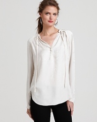 An easy, silk Rebecca Taylor blouse flaunts a croc print and pleats at the back for understated elegance with a touch of the exotic. An easy, silk Rebecca Taylor blouse flaunts a croc print and pleats at the back for understated elegance with a touch of the exotic.