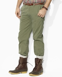 An essential trim-fitting pant in a lightweight cotton chino is tailored with a slightly tapered leg, a flat front and a classic rise. An essential trim-fitting pant in a lightweight cotton chino is tailored with a slightly tapered leg, a flat front and a classic rise.